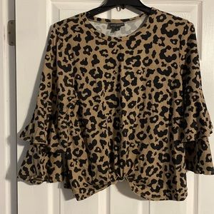 Leopard print top with ruffle sleeves. Xlarge. Never worn.